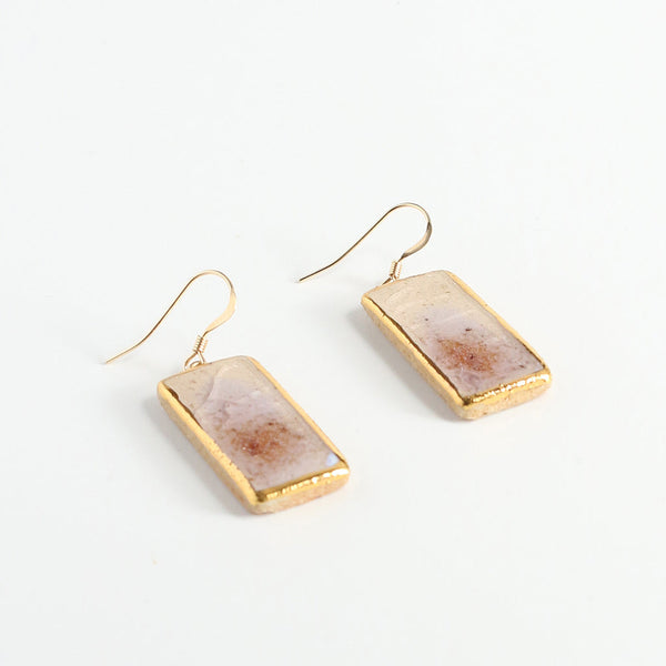 Rectangular stone earrings with gold accents on a white background