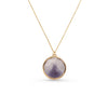 Necklace with a round purple pendant on a gold chain against a white background