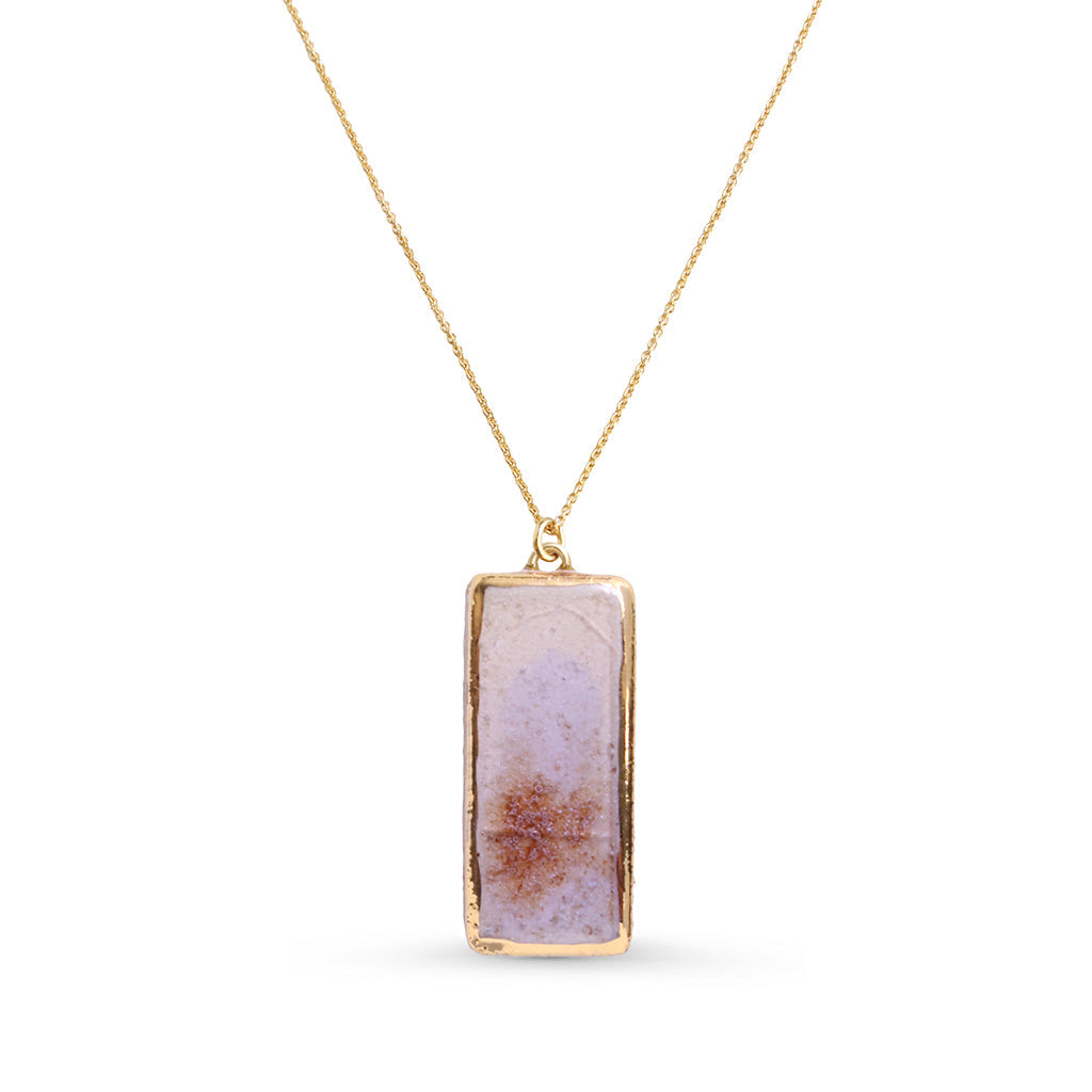 Necklace with a rectangular pendant on a white background