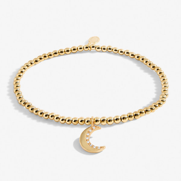 Goldenes „A Little“-Armband mit der Aufschrift „Love You To The Moon And Back“.