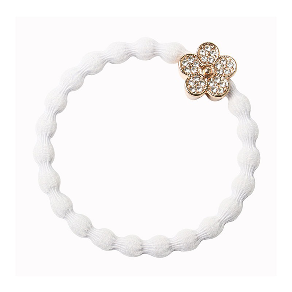 Bracelet élastique avec fleur de marguerite scintillante sur blanc