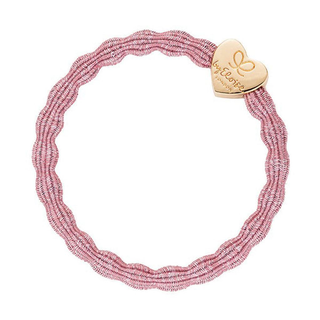 Bracelet élastique en forme de cœur doré métallisé sur rose rose