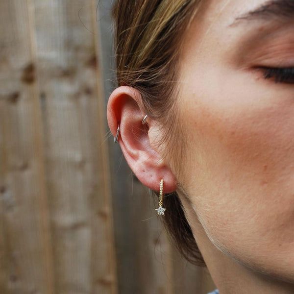 White Cubic Zirconia Star Drop Huggie Earring In Gold - Insideout